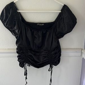 Size large, satin material, never worn